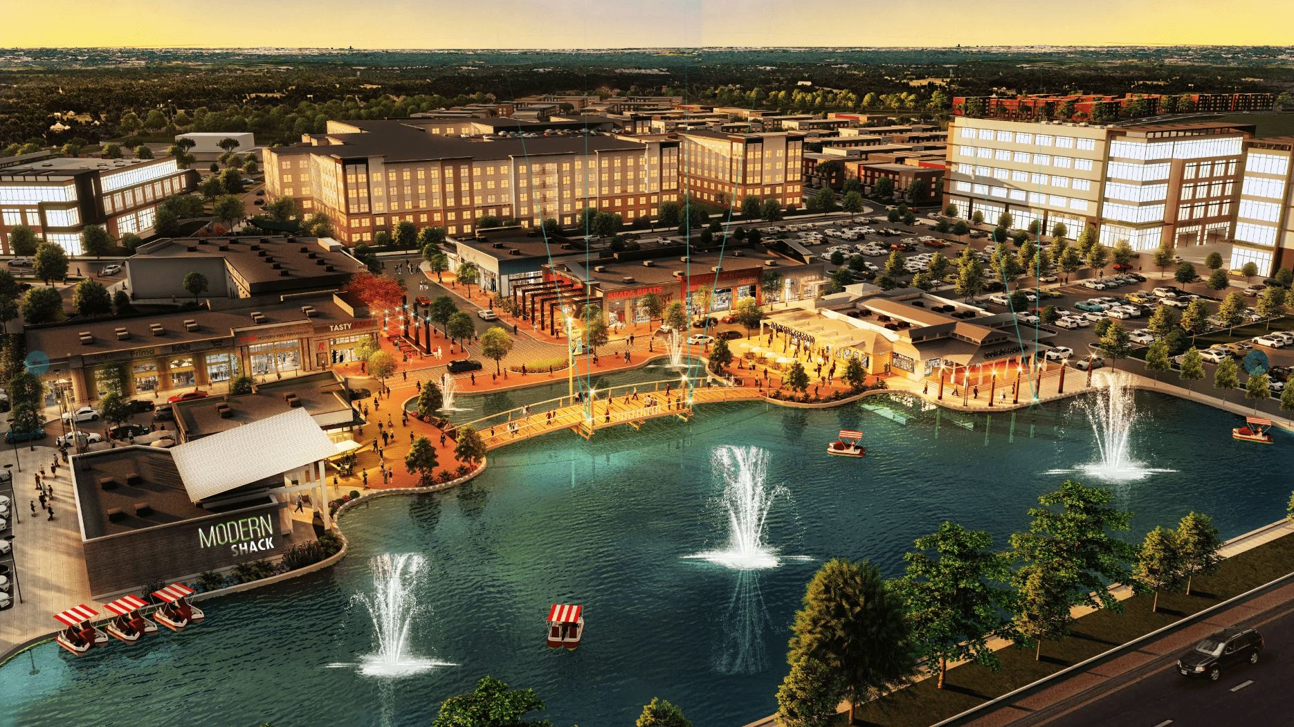 Rendering of Quartz District - Urban Core District. Multiple new buildings sit in front of a waterway with 3 fountains. A walking bridge connects the waterway.